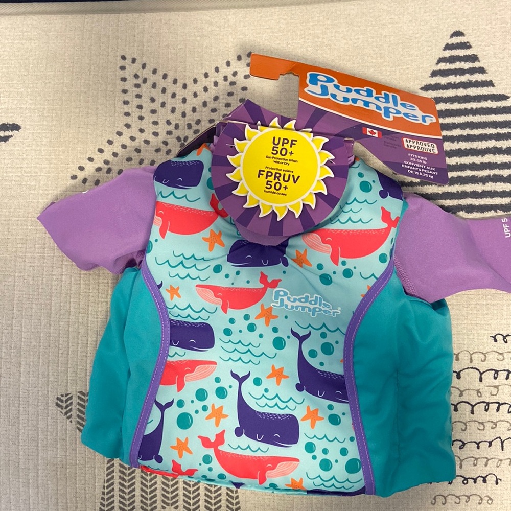Puddle Jumper 2-in-1 personal flotation device and rash guard